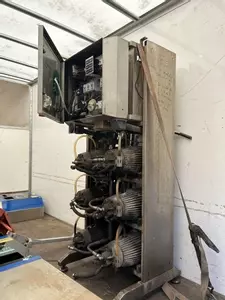 Delta booster pressure washer in worn condition before being fully reconditioned for installation at a factory in Measham.